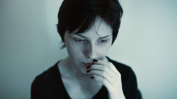 Afraid Adult female expressing dismay.