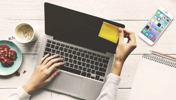 User working on a laptop